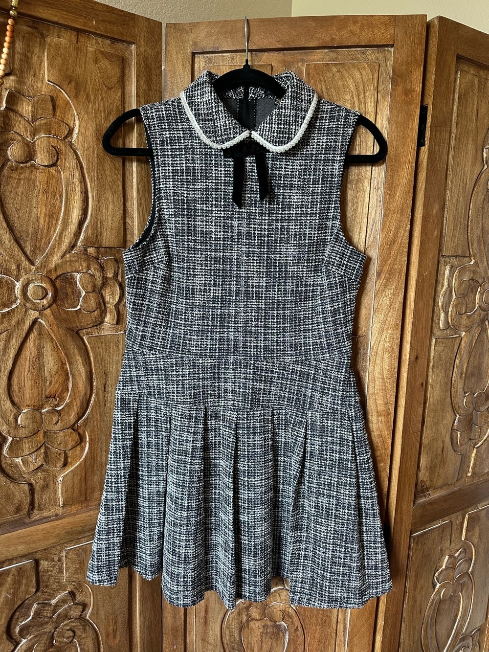 City Triangles sleeveless pleated mini.